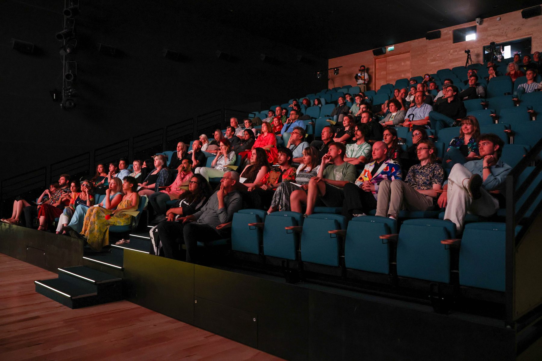 The audience at Edison Cinema watching a festival screening.
